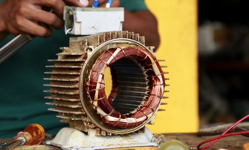 Old electric motor needs maintenance repairman during maintenance work of electric motors